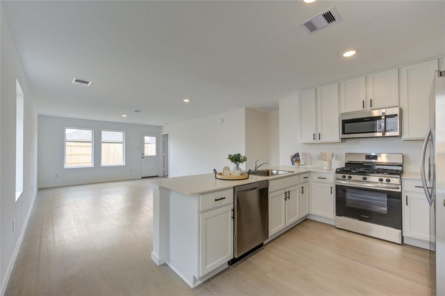 Bright open-concept living area filled with natural light