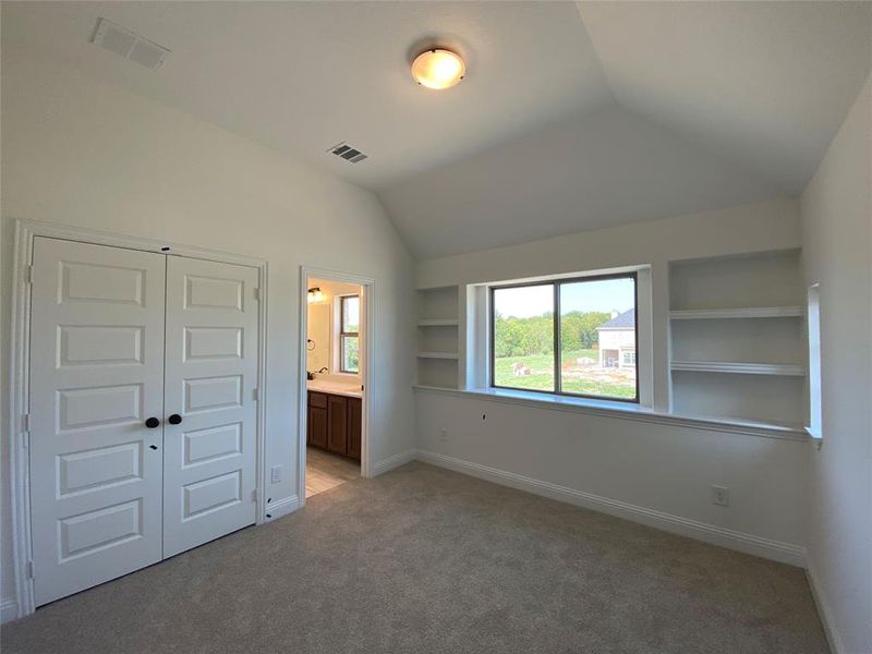 Bed #3 with vaulted ceiling & built-in shelves Bed #3 with vaulted ceiling & built-in shelves