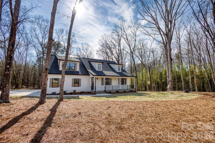 Front exterior of a new home in , Catawba, SC, highlighting curb appeal (Image 21).