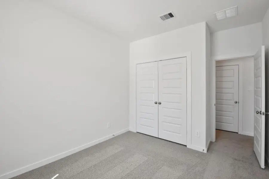 Spacious, unfurnished interior of a new home in Spring Brook Village - City Series, Houston (Image 17).