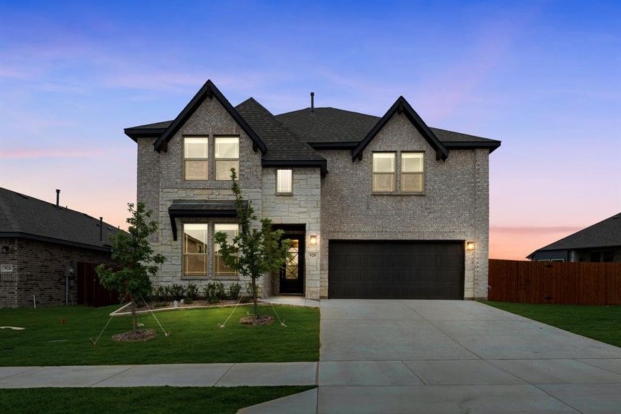 Front exterior of a new home in Star Ranch, Godley, TX, highlighting curb appeal (Image 2).