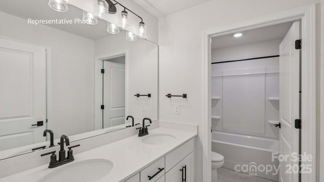 Furnished interior view inside a new home in Sanctuary at Southgate, Indian Trail (Image 9).