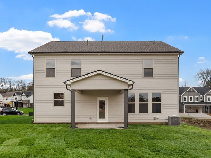 Exterior details and patio area of a home in Woods Crossing, Gallatin (Image 27).
