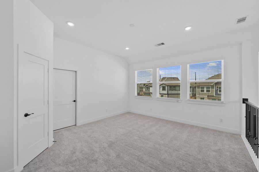 Spacious, unfurnished interior of a new home in Meridiana, Manvel (Image 23).