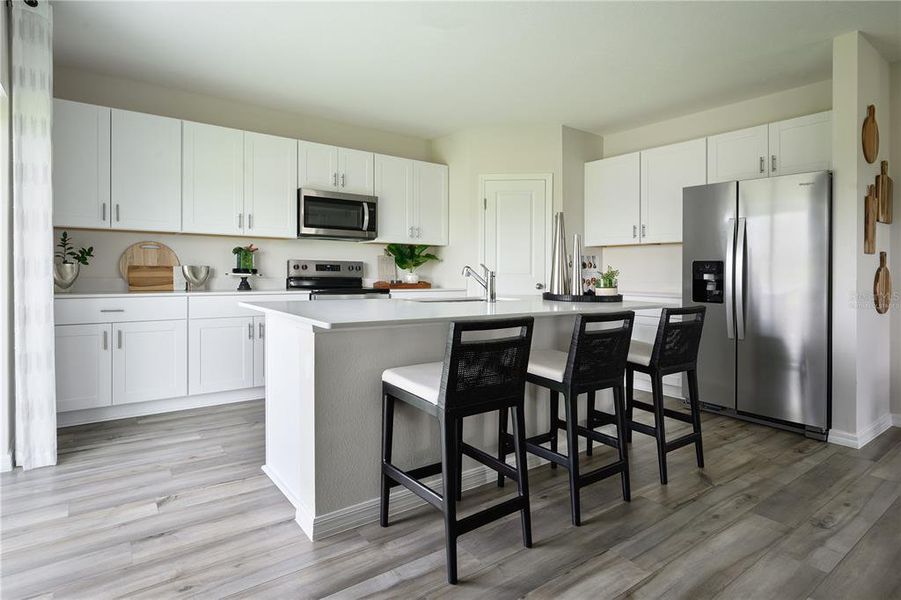 Furnished interior in a model home at Crosswinds in Haines City (Image 6).