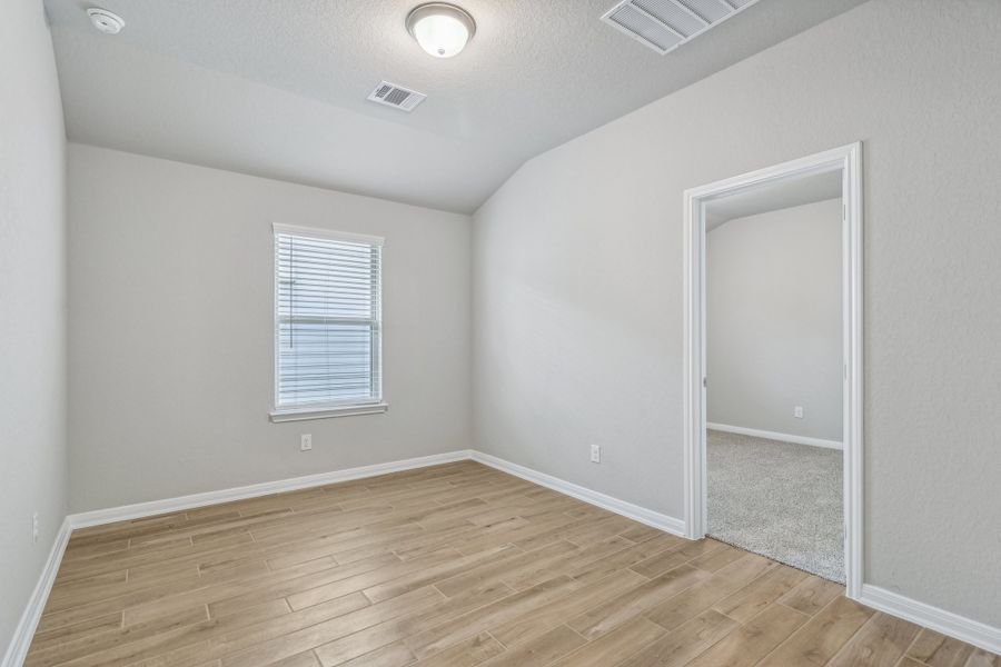 Guest bedroom in the Allen floorplan at a Meritage Homes community. Guest bedroom in the Allen floorplan at a Meritage Homes community.