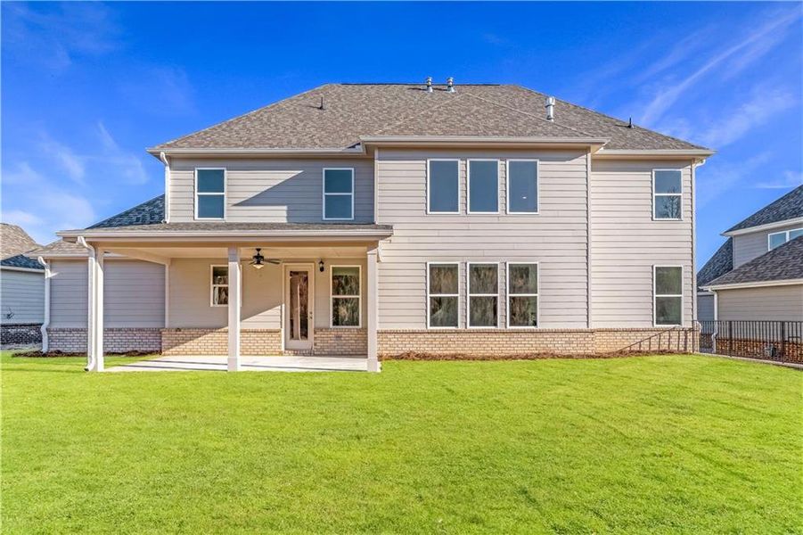 Exterior details and patio area of a home in The Manor at Gainesville Township, Gainesville (Image 3).