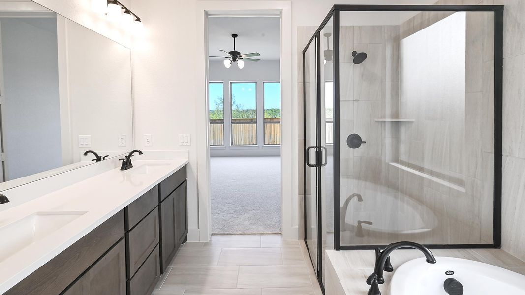 Furnished interior view inside a new home in Crosswinds 50', Kyle (Image 11).