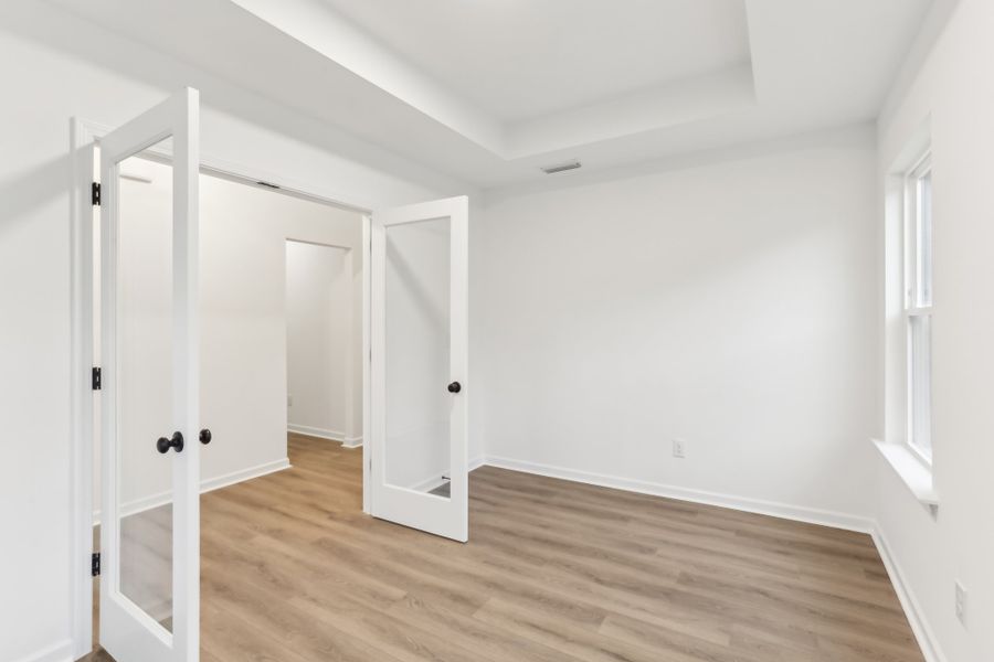 Representative unfurnished interior of a home built from the Alexis by Ashton Woods in Rowland's Grant, Fuquay Varina (Image 41).
