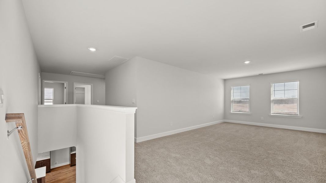 Representative unfurnished interior of a home built from the Summit by D.R. Horton in Evergreen Crossing, Locust Grove (Image 23).