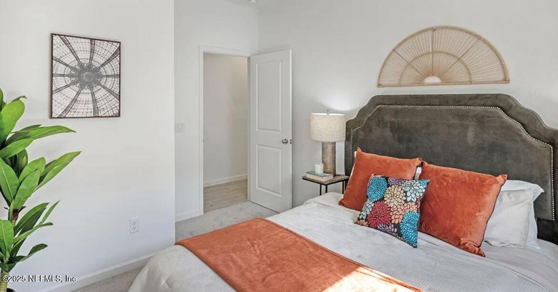 Furnished interior view inside a new home in Edenbrooke at Hyland Trail | 55+: Edenbrooke at Hyland Trail 50s, Green Cove Springs (Image 26).