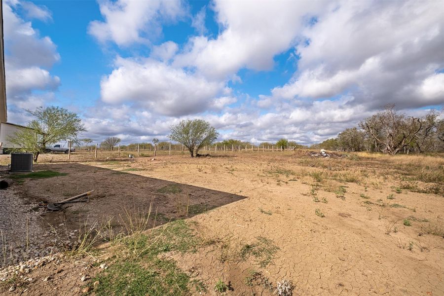 View of yard with a view of rural / pastoral area