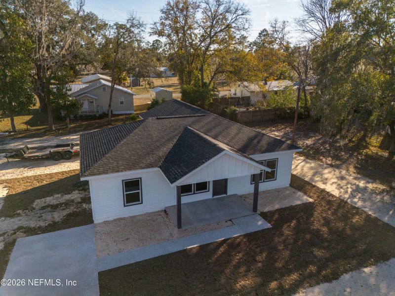 Front exterior of a new home in , Lake Butler, FL, highlighting curb appeal (Image 21). Front exterior of a new home in , Lake Butler, FL, highlighting curb appeal (Image 21).