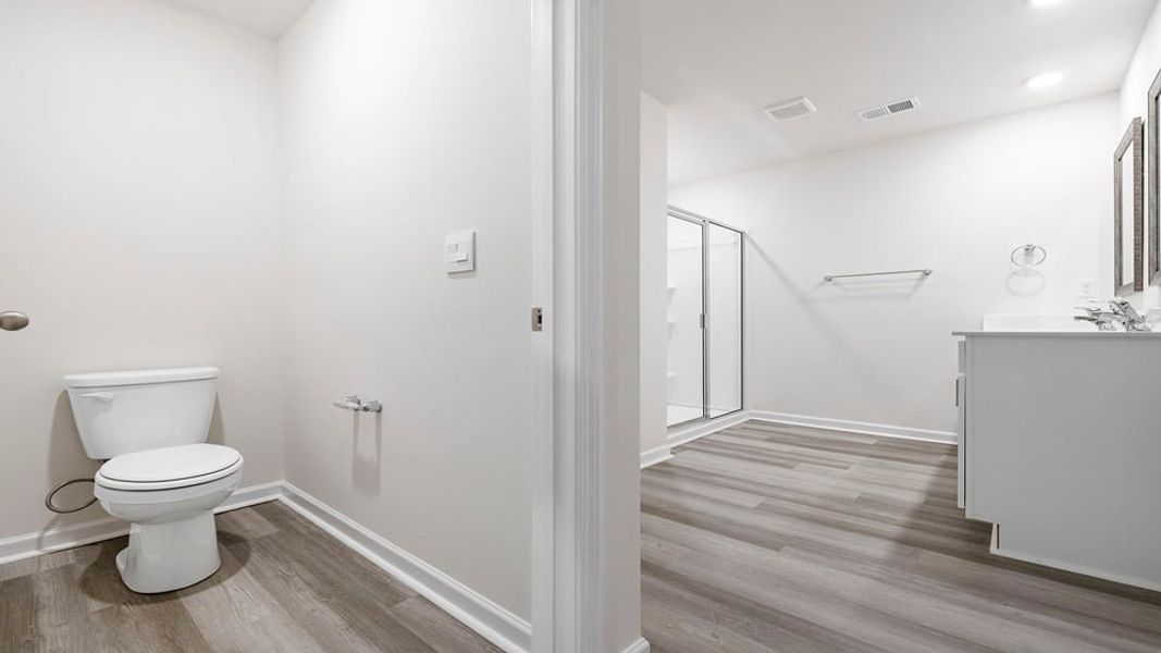 Spacious, unfurnished interior of a new home in Bentley Park, Greenwood (Image 25).