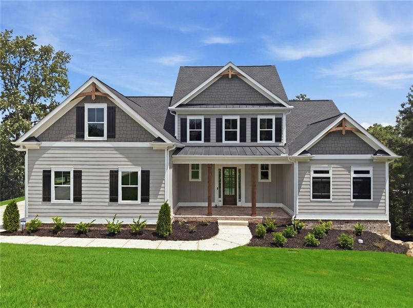 Front exterior of a new home in , Flowery Branch, GA, highlighting curb appeal (Image 2). Front exterior of a new home in , Flowery Branch, GA, highlighting curb appeal (Image 2).