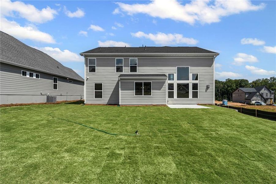 Front exterior of a new home in Twin Lakes, Hoschton, GA, highlighting curb appeal (Image 21). Front exterior of a new home in Twin Lakes, Hoschton, GA, highlighting curb appeal (Image 21).