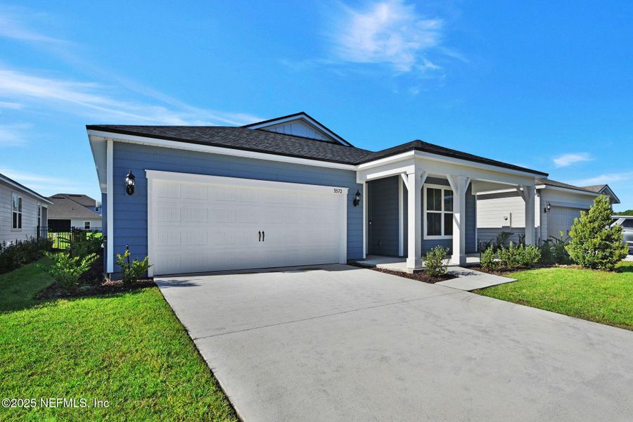 Front exterior of a new home in Hyland Trail, Green Cove Springs, FL, highlighting curb appeal (Image 20). Front exterior of a new home in Hyland Trail, Green Cove Springs, FL, highlighting curb appeal (Image 20).
