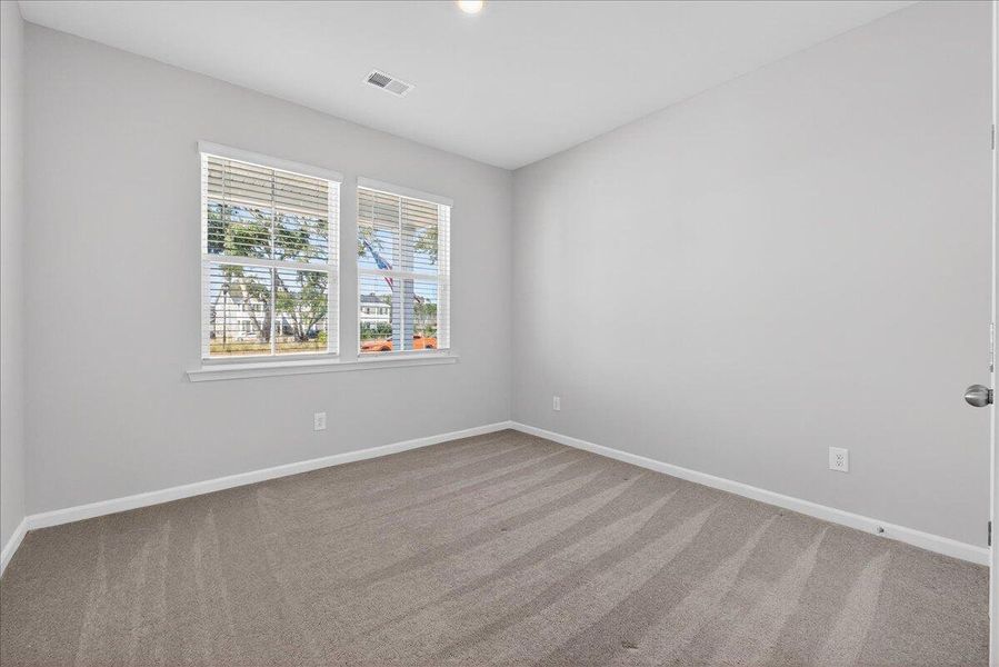 Spacious, unfurnished interior of a new home in Sweetgrass at Summers Corner, Summerville (Image 27).