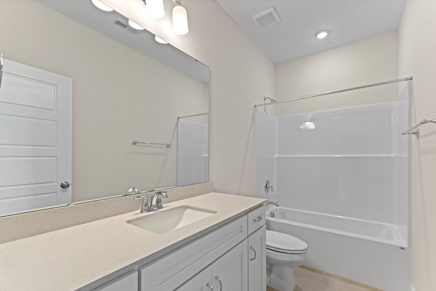 Representative furnished interior of a home built from the The Juniper by RobuckHomes in Kennebec Crossing, Angier (Image 63).