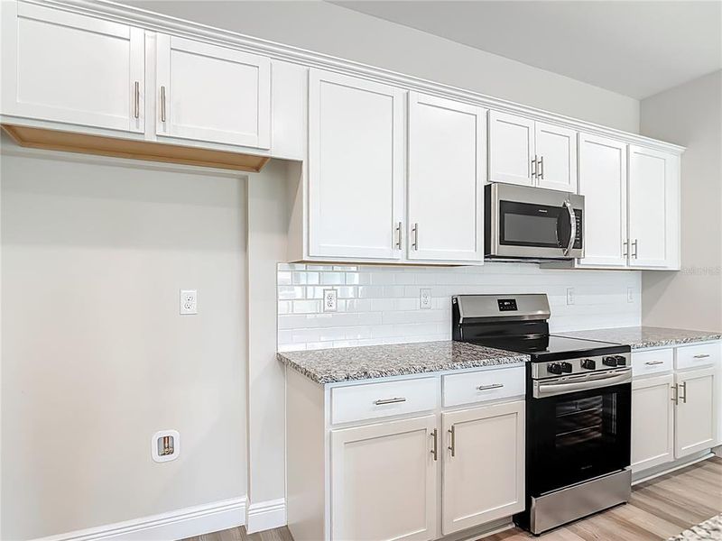 Furnished interior view inside a new home in , North Port (Image 31).