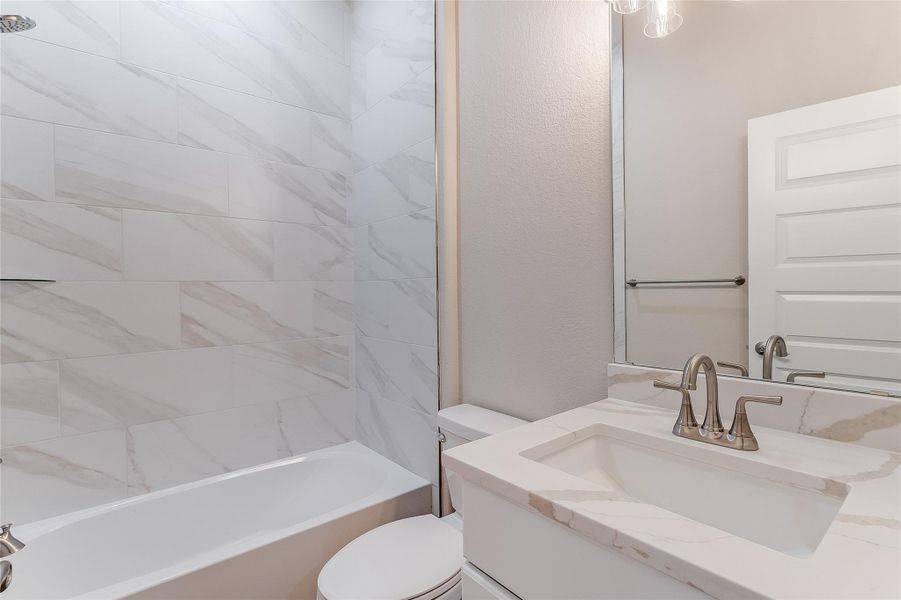 Full bath with vanity and shower / bathtub combination