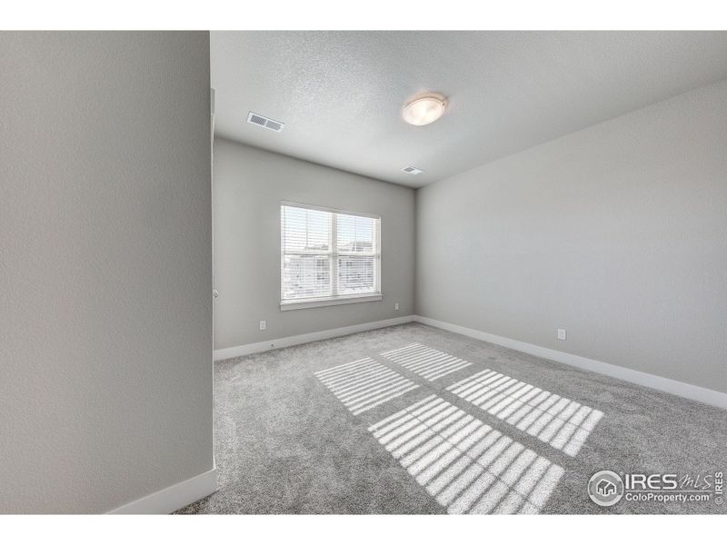 Spacious, unfurnished interior of a new home in Highlands at Fox Hill - The Flats, Longmont (Image 18).