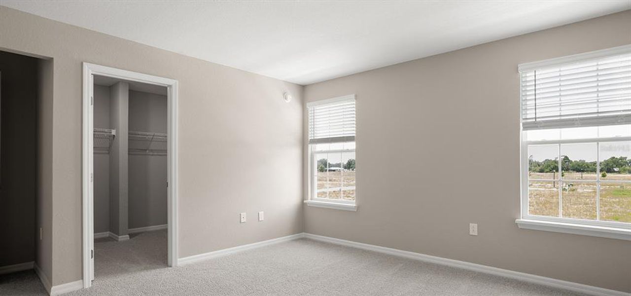 Spacious, unfurnished interior of a new home in Estates at Hickory Cove - Bungalows, St. Cloud (Image 11).
