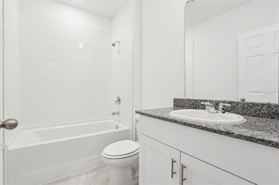 Furnished interior view inside a new home in Lawson Dunes - Signature Series, Haines City (Image 8). Furnished interior view inside a new home in Lawson Dunes - Signature Series, Haines City (Image 8).