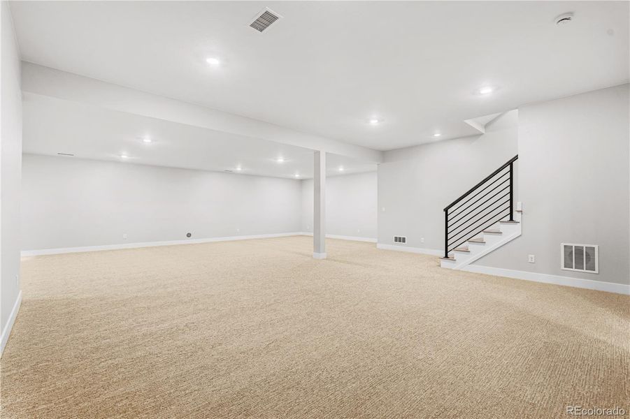 Spacious, unfurnished interior of a new home in Luxe at The Canyons, Castle Pines (Image 41).