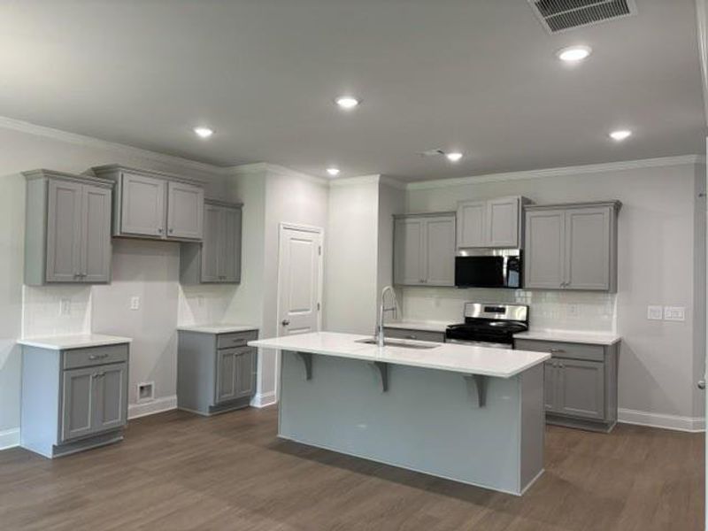 Furnished interior view inside a new home in , Suwanee (Image 6). Furnished interior view inside a new home in , Suwanee (Image 6).
