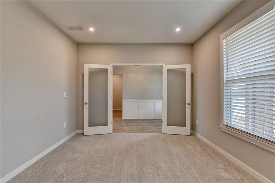 Spacious, unfurnished interior of a new home in The Reserve At Liberty Park, Braselton (Image 24).