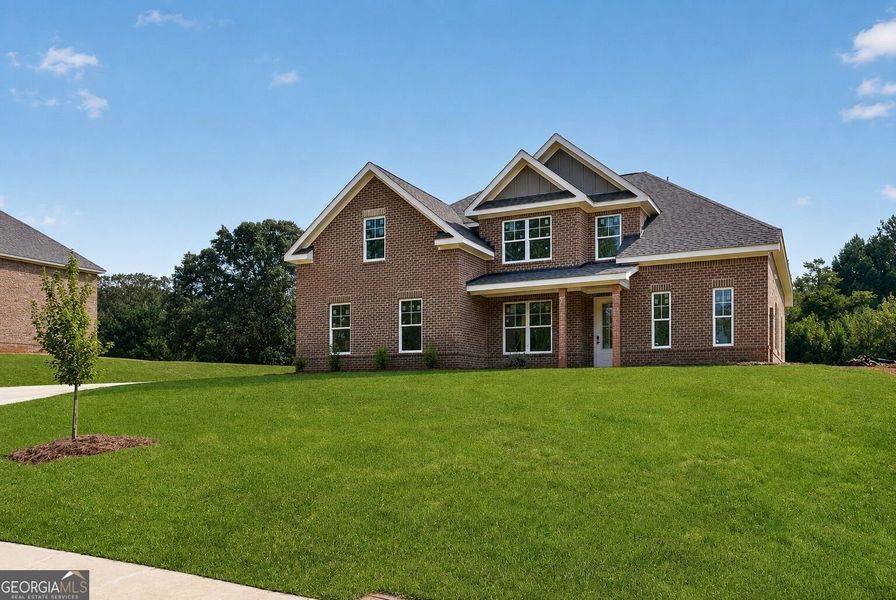 Front exterior of a new home in Patillo Manor, Stockbridge, GA, highlighting curb appeal (Image 18).