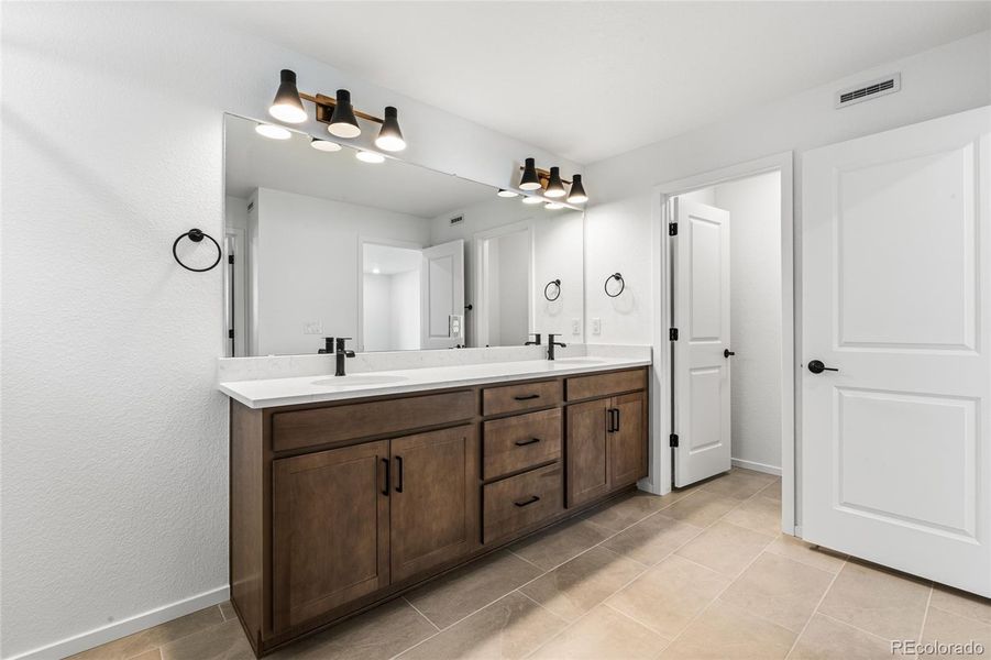 Furnished interior view inside a new home in Harvest Crossing, Aurora (Image 10).