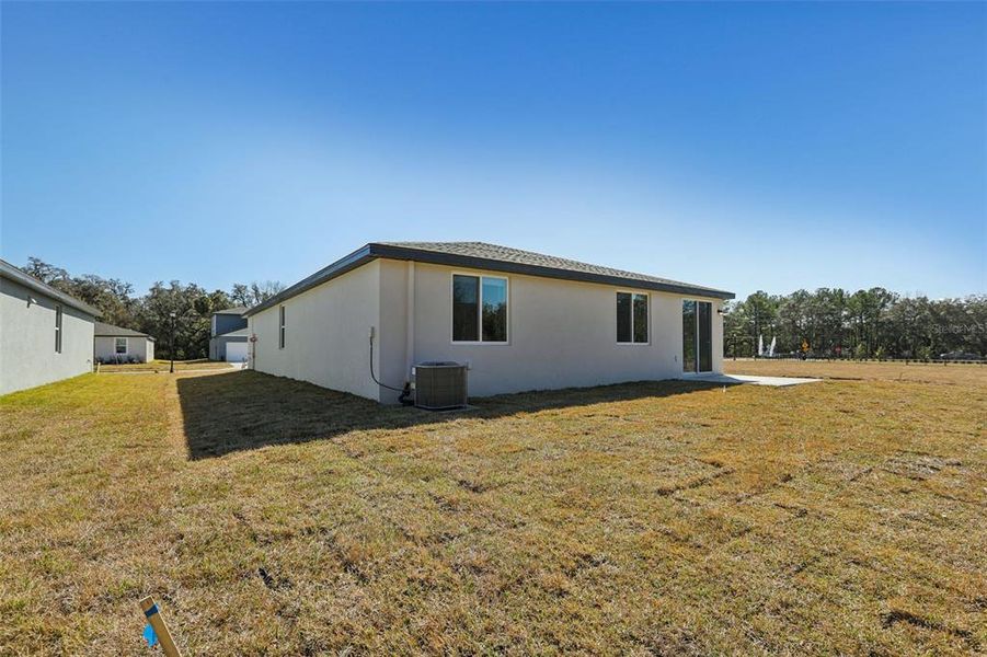 Exterior details and patio area of a home in Leyland Preserve - Classic Series, Brooksville (Image 4).