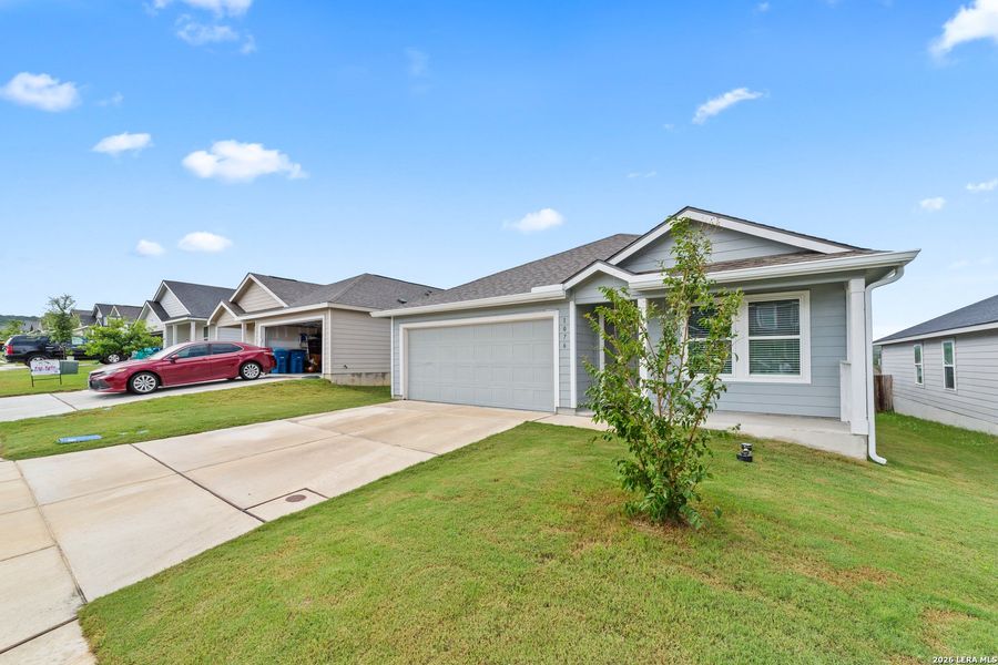 Front exterior of a new home in Ridgeland, Kerrville, TX, highlighting curb appeal (Image 20). Front exterior of a new home in Ridgeland, Kerrville, TX, highlighting curb appeal (Image 20).