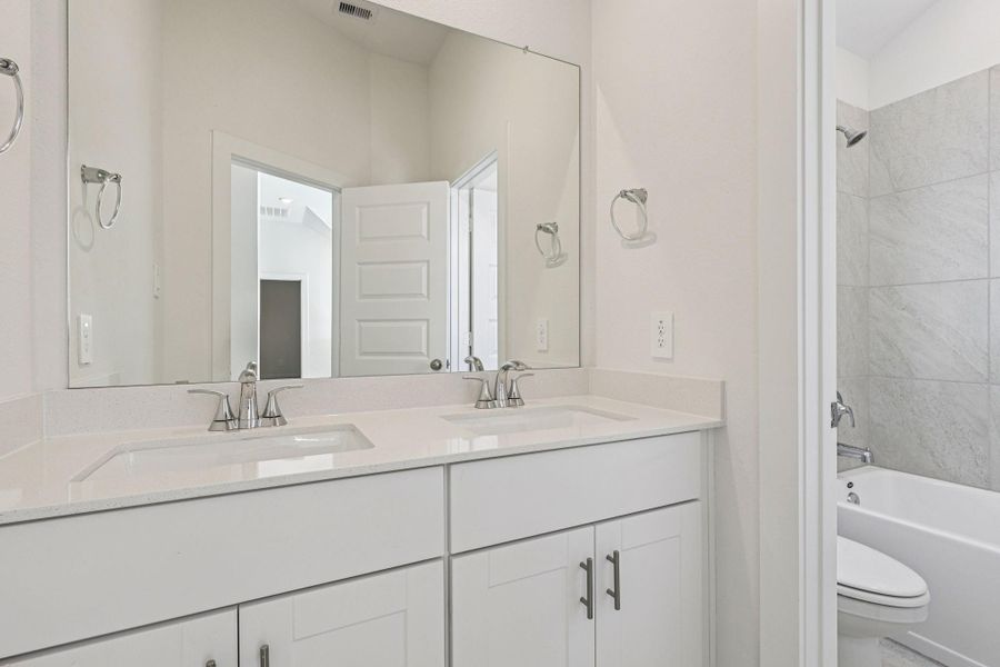 Furnished interior view inside a new home in Stewart's Ranch, Conroe (Image 12).