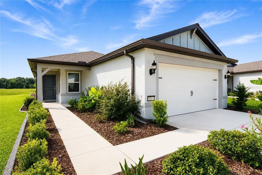 Front exterior of a new home in , Ocala, FL, highlighting curb appeal (Image 24). Front exterior of a new home in , Ocala, FL, highlighting curb appeal (Image 24).