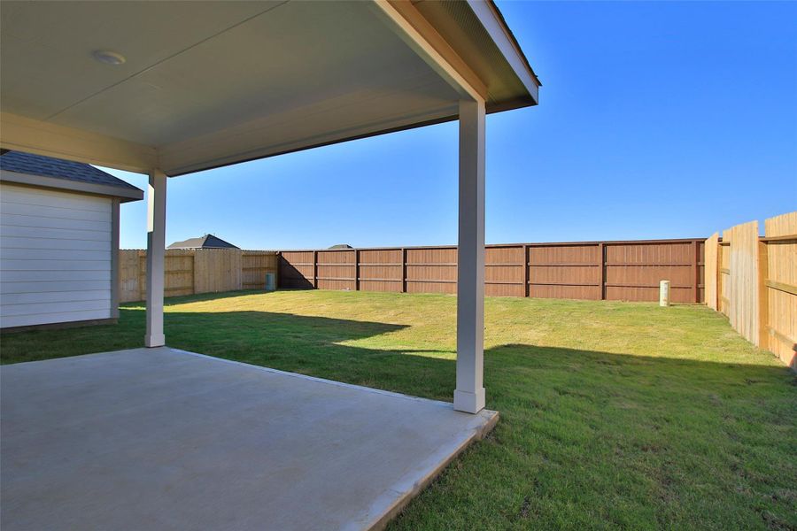 Exterior details and patio area of a home in Oakwood Estates, Waller (Image 19). Exterior details and patio area of a home in Oakwood Estates, Waller (Image 19).