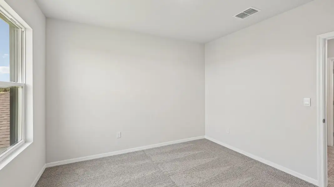 Representative unfurnished interior of a home built from the Hayden by D.R. Horton in Pinellas County Spot Lots, Pinellas Park (Image 26).