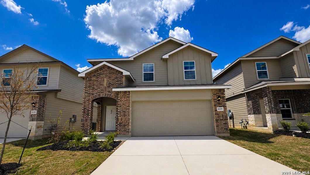 Front exterior of a new home in Seneca Trails, San Antonio, TX, highlighting curb appeal (Image 2). Front exterior of a new home in Seneca Trails, San Antonio, TX, highlighting curb appeal (Image 2).