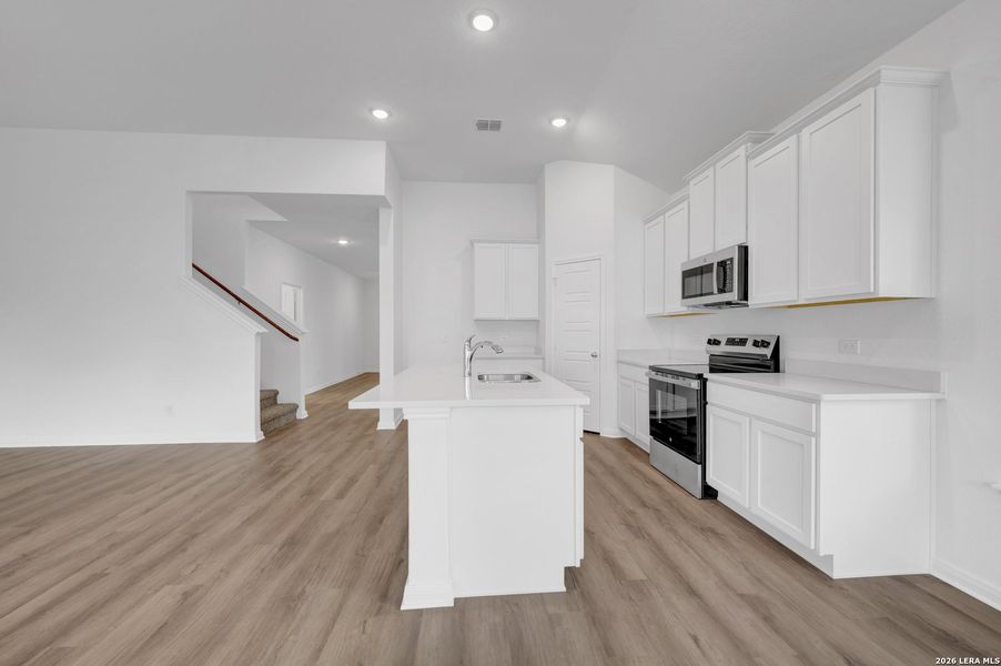 Furnished interior view inside a new home in Greenspoint Heights, Seguin (Image 15).