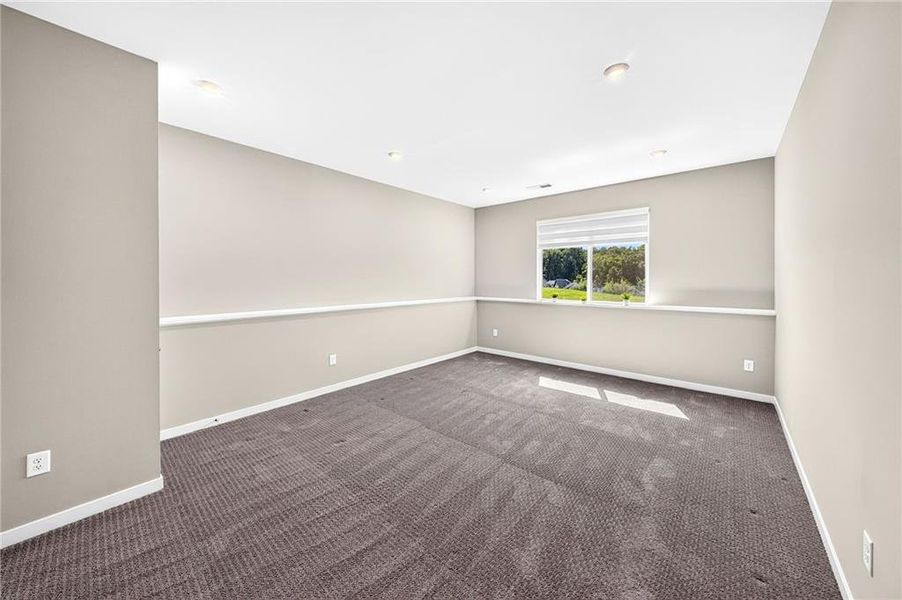 Spacious, unfurnished interior of a new home in The Reserve At Liberty Park, Braselton (Image 22).