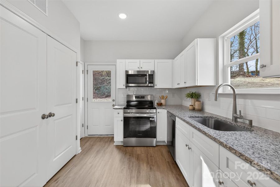 Furnished interior view inside a new home in , Statesville (Image 8).