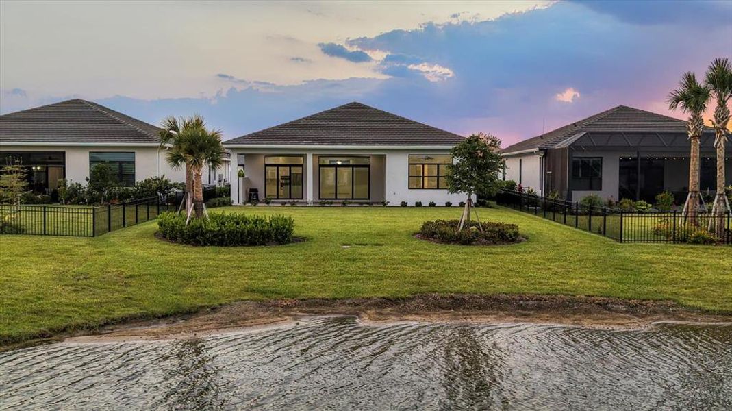 Front exterior of a new home in , Sarasota, FL, highlighting curb appeal (Image 30).