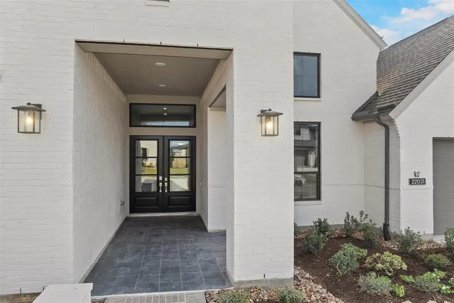 Exterior details and patio area of a home in Bridgeland 70′, Cypress (Image 3).