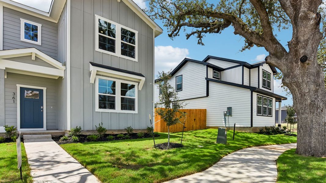 Front exterior of a new home in Valverde, Bastrop, TX, highlighting curb appeal (Image 22).
