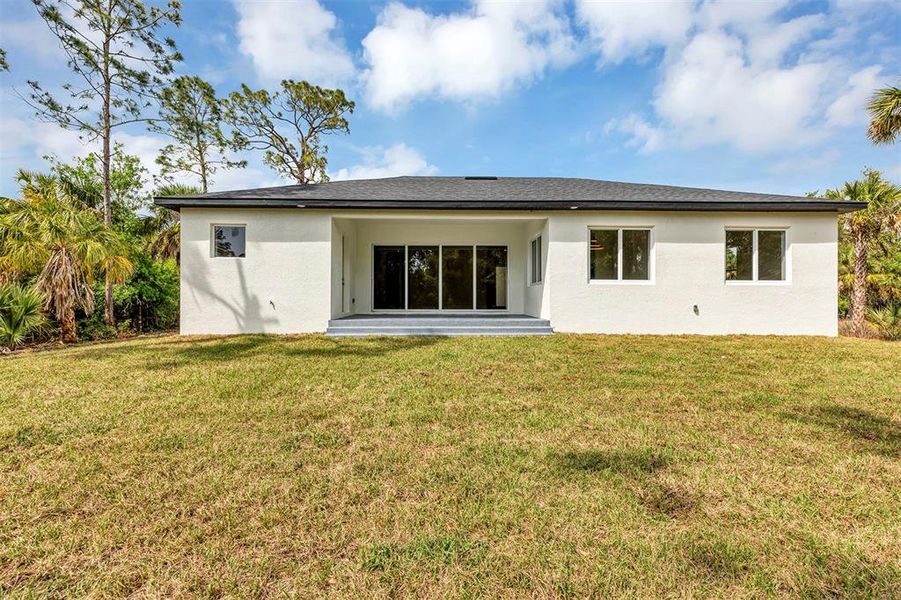 Exterior details and patio area of a home in , Port Charlotte (Image 3).