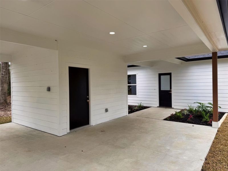 Exterior details and patio area of a home in , Trinity (Image 18).