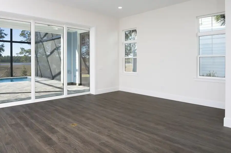 Representative unfurnished interior of a home built from the Grand Spinnaker by Minto Communities in Latitude Margaritaville Watersound, Panama City Beach (Image 16).