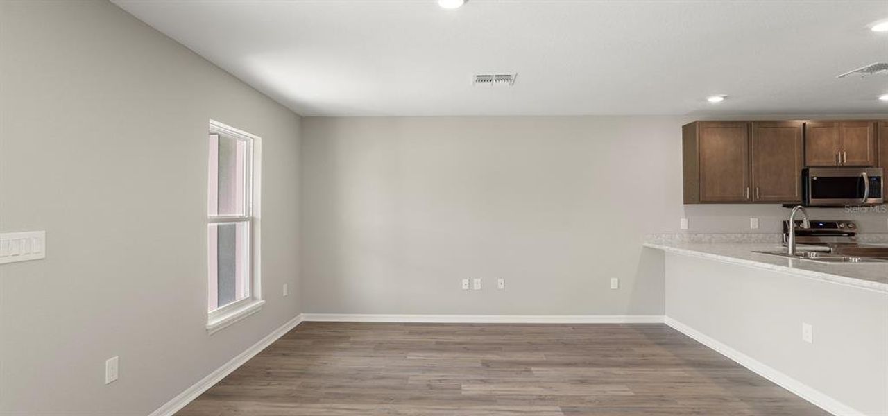 Spacious, unfurnished interior of a new home in Harbor at Lake Henry - Townhomes, Winter Haven (Image 20).